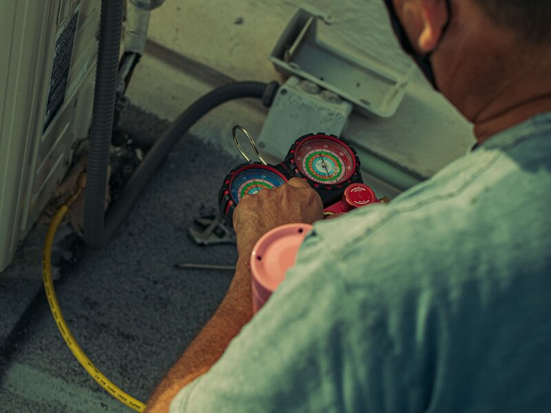 HVAC refrigerant gauges during an Airo maintenance visit